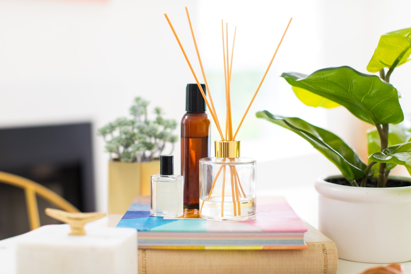 horizontal photo of a reed diffuser by top Houston lifestyle blogger Ashley Rose of Sugar & Cloth