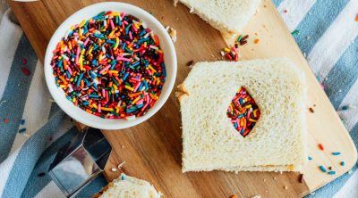 photo of a peanut butter and jelly sandwich version of fairy bread recipe by top Houston lifestyle blogger Ashley Rose of Sugar & Cloth
