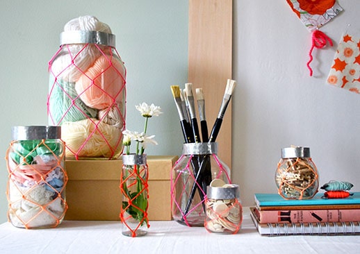 display of macrame cover on jars