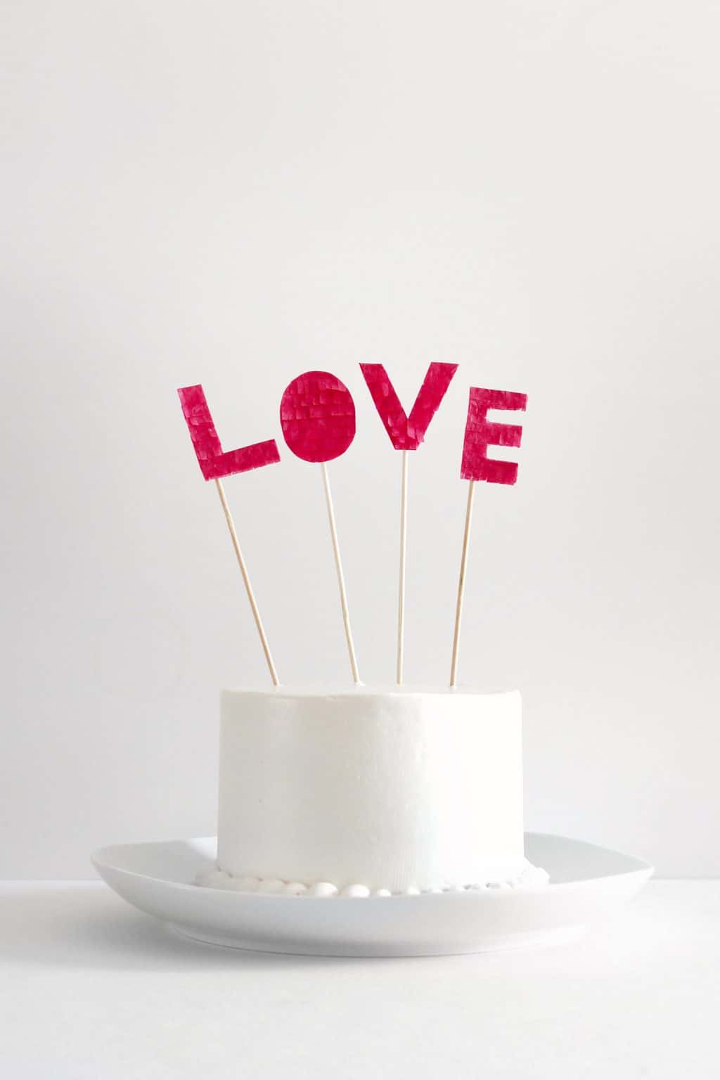 DIY Fringed love cake topper - Sugar and Cloth