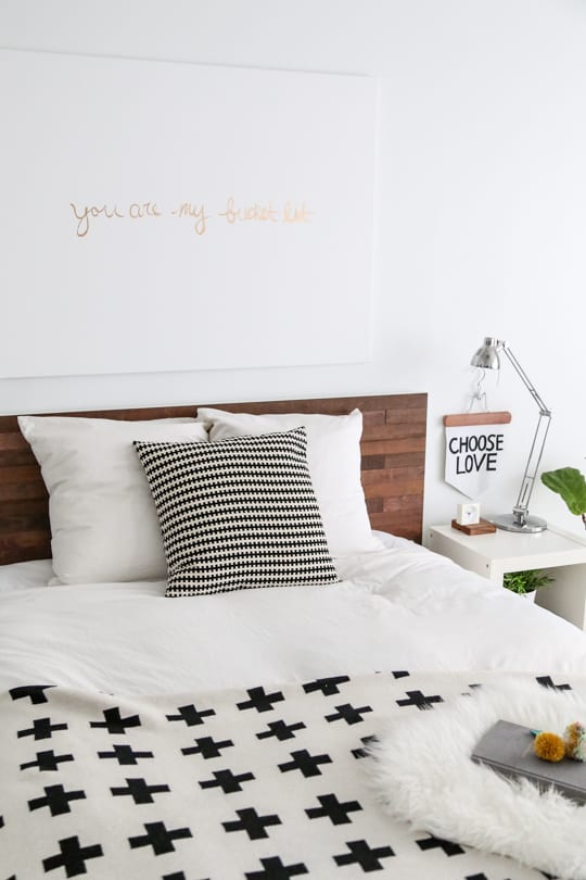 perfect weekend project! Easy Ikea Hack DIY Wooden Headboard With Stikwood by top houston blogger Ashley Rose of Sugar and cloth