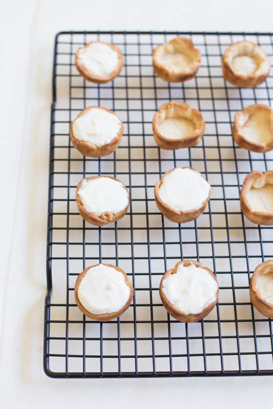 mini lemon cheesecake pies | sugarandcloth.com