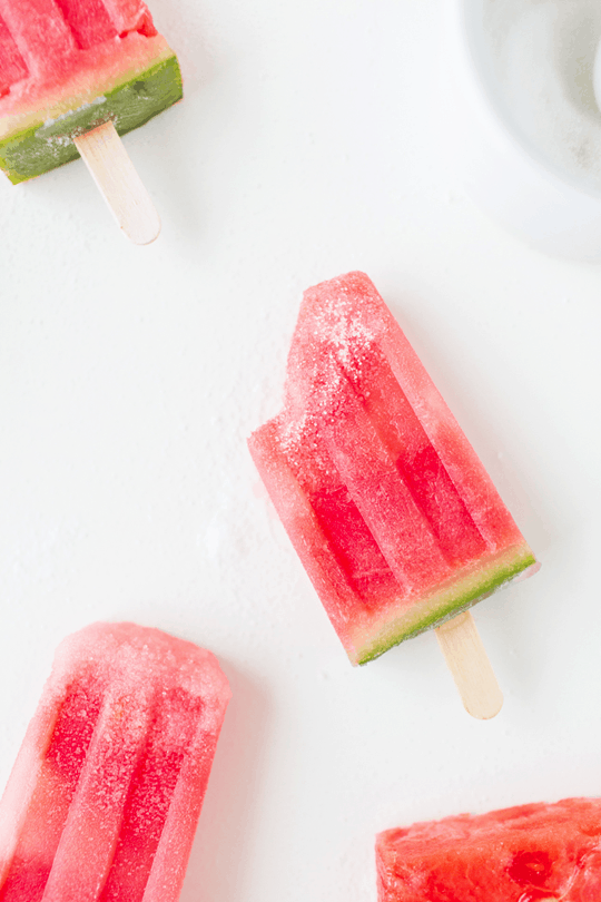 Spiked crushed watermelon popsicles| sugarandcloth.com