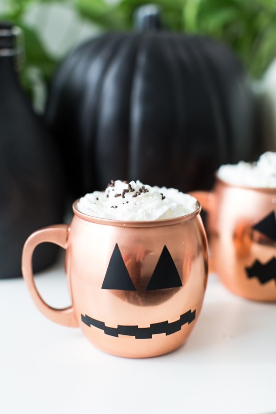 photo of a copper mug with a pumpkin face for halloween