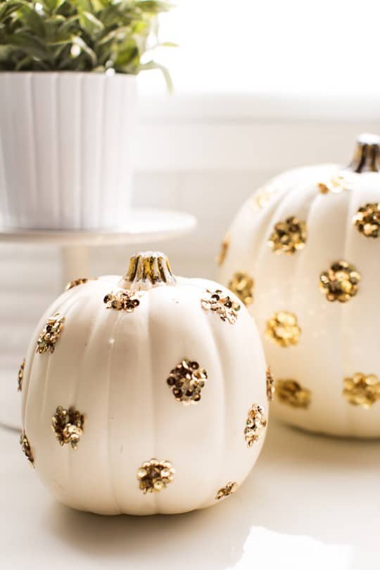 DIY Sequin Polka Dot Pumpkin by top Houston blogger Ashley Rose | sugarandcloth.com #halloween #festive #pumpkin #sequin #fall #thansksgiving #diy #diypumpkin #glam #glamhalloween #homedecor #diydecor #polkadot