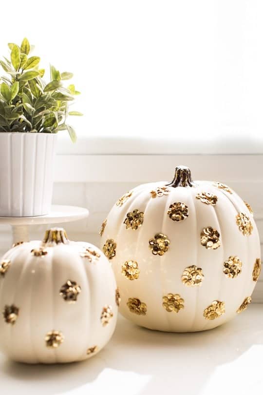 DIY Sequin Polka Dot Pumpkin by top Houston blogger Ashley Rose | sugarandcloth.com #halloween #festive #pumpkin #sequin #fall #thansksgiving #diy #diypumpkin #glam #glamhalloween #homedecor #diydecor #polkadot