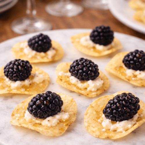 Blackberry and goat cheese appetizers with potato chips