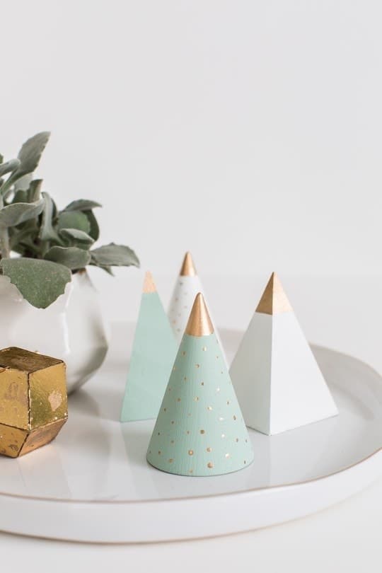 photo of a plate decorated with DIY wooden christmas trees by sugar and cloth