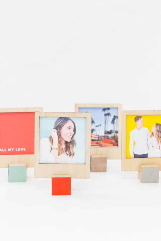 Different wooden polaroid holder with photos- polaroid display ideas