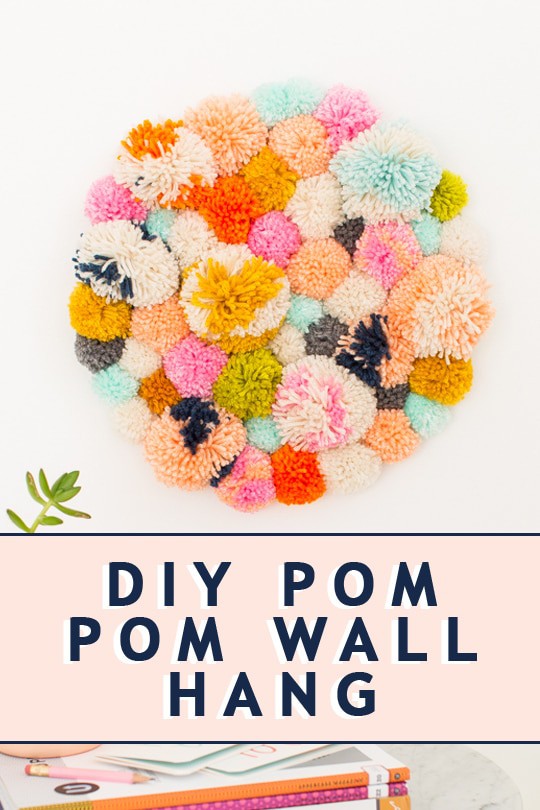 photo of the DIY Pom Pom Wall Hang by top Houston lifestyle blogger Ashley Rose of Sugar & Cloth