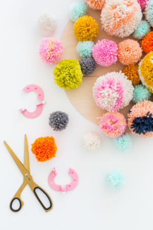 How To Make A DIY Pom Pom Wall Hanging - Pom Pom Wall Art