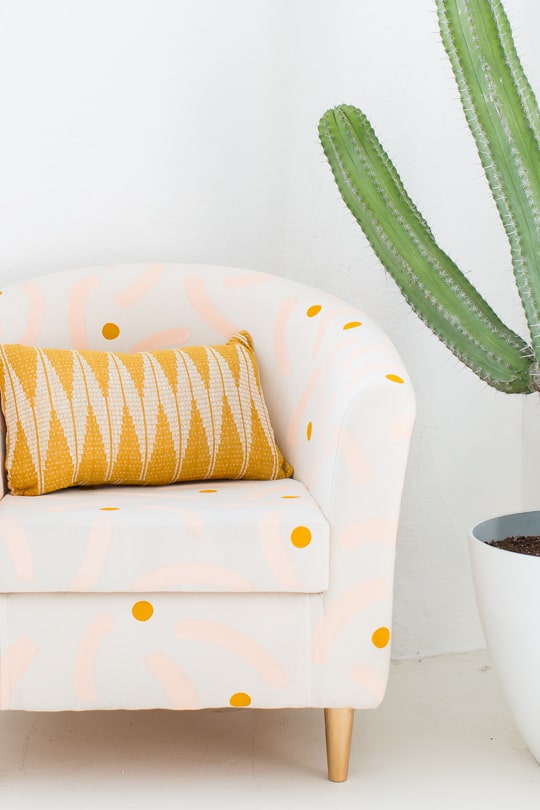 yellow patterned armchair