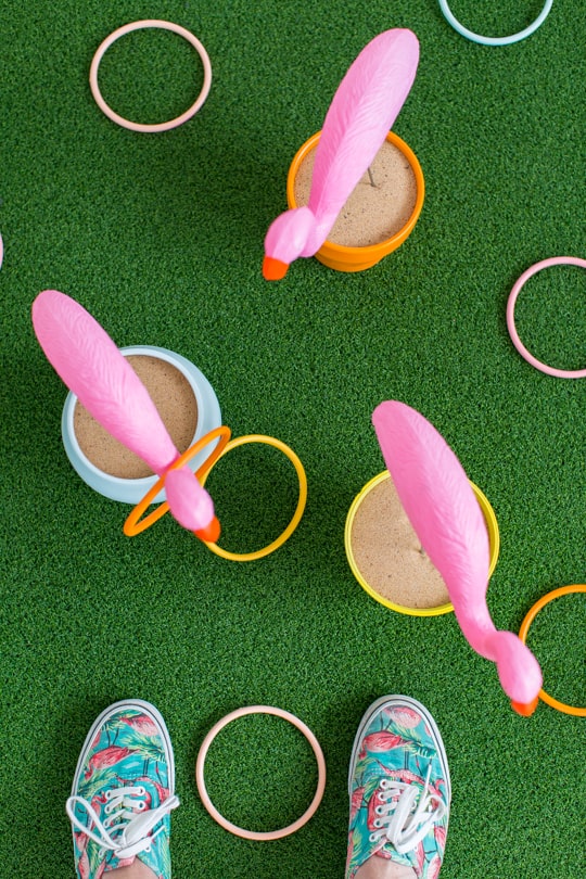 photo of DIY flamingo ring toss yard game by Ashley Rose of Sugar & Cloth, an award winning DIY and entertaining blog.