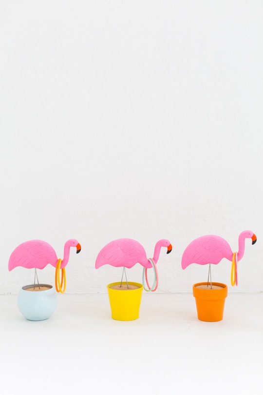 photo of the DIY flamingo ring toss yard game if you don't have a backyard by Ashley Rose of Sugar & Cloth, an award winning DIY and entertaining blog.