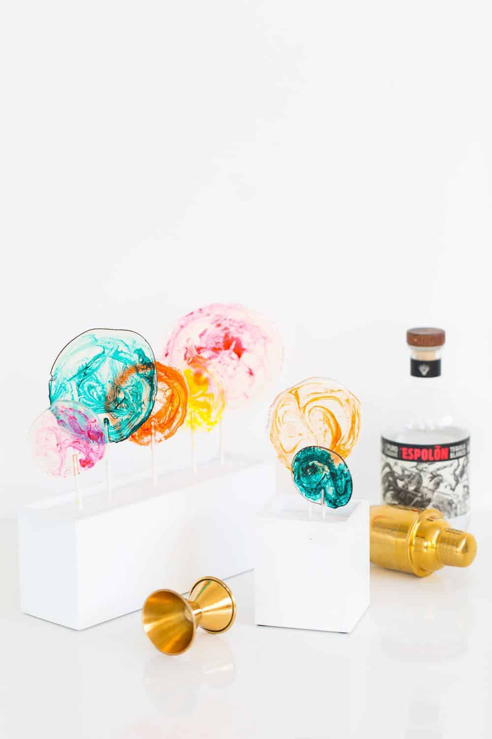 DIY Marble Spiked Lollipops by Sugar & Cloth Top Houston Lifestyle Blogger Ashley Rose #lollipops #diy #recipe #marble #spiked #tequila #alcohol #adult #candy #sweets