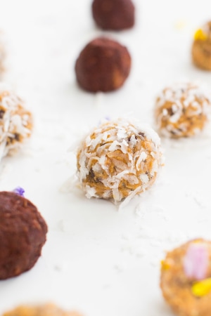 an energy ball with coconut flakes on it