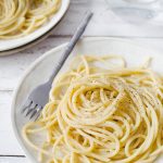 two bowls of cacio e pepe pasta