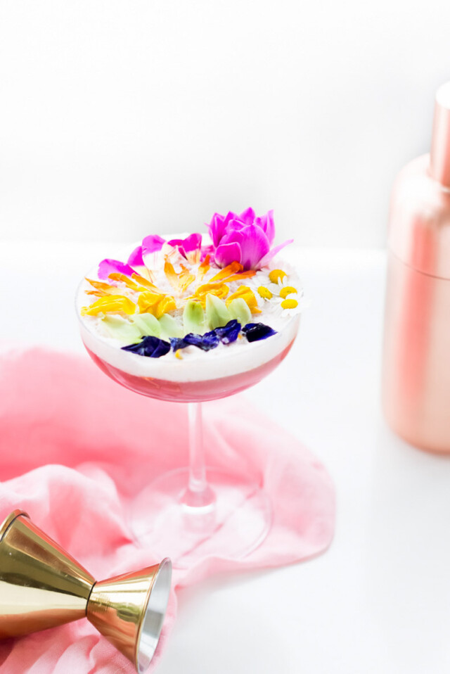 A perfectly Spring edible flower Rainbow Sour cocktail recipe that's almost too pretty to drink! - sugar and cloth