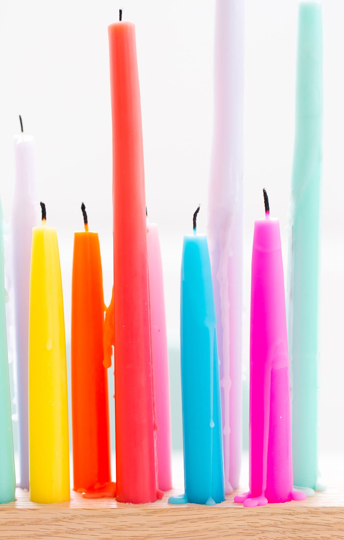 A perfectly colorful rainbow DIY taper candle holder for parties and entertaining - sugar and cloth