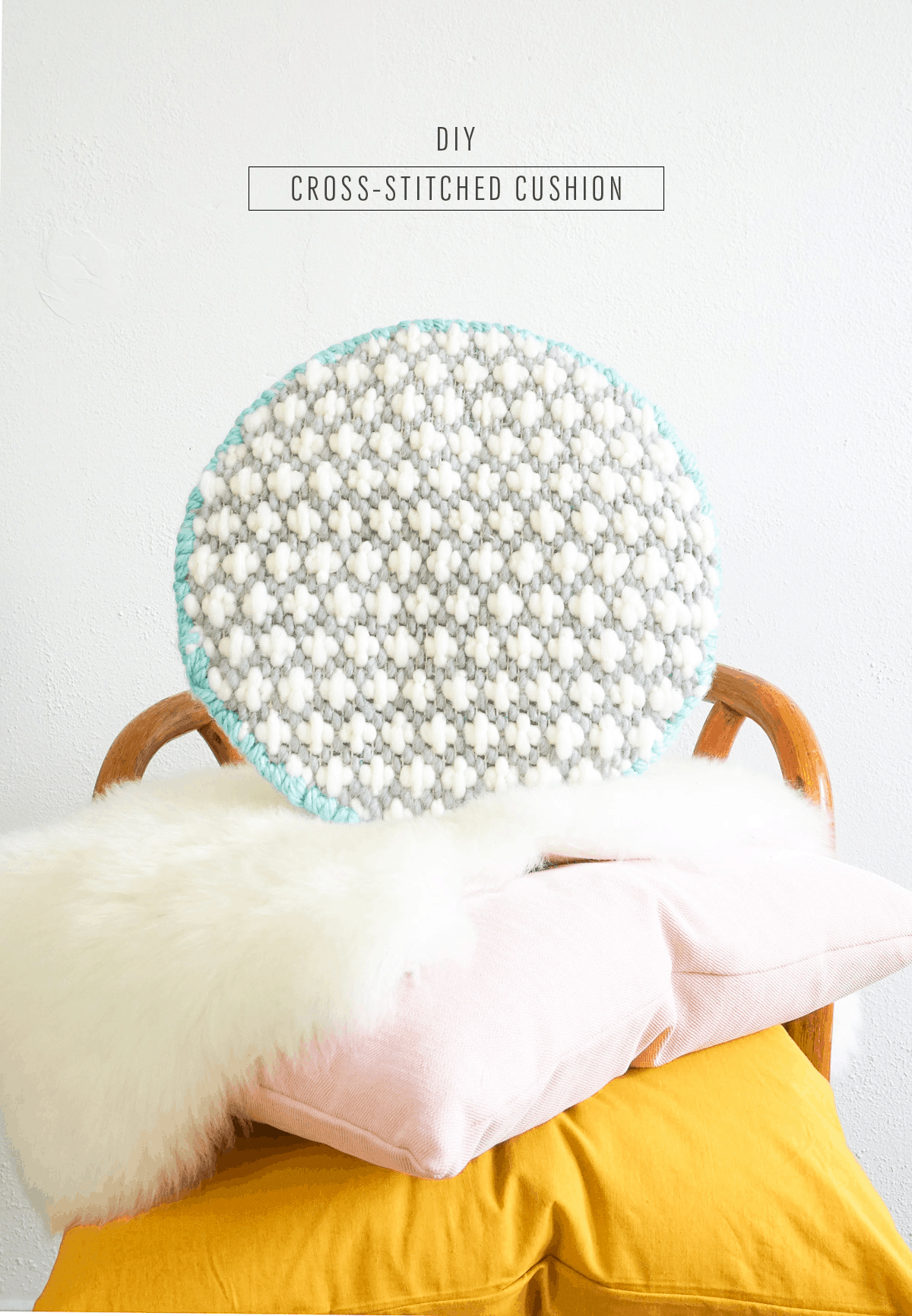 A modern DIY cross-stitched cushion to add texture to your home decor space! - sugar and cloth
