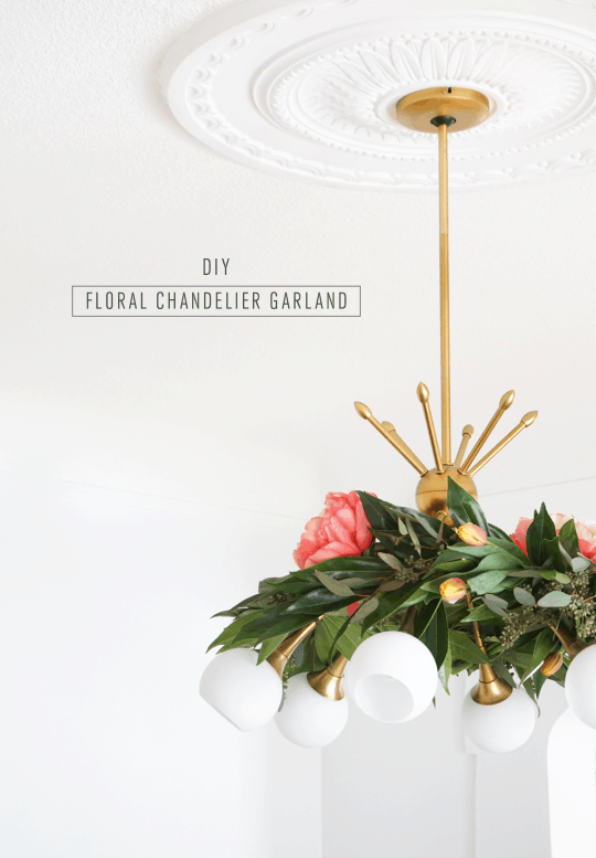 Pretty for Spring! This DIY floral chandelier garland is the perfect touch to your living room decor during your next dinner! - sugar and cloth