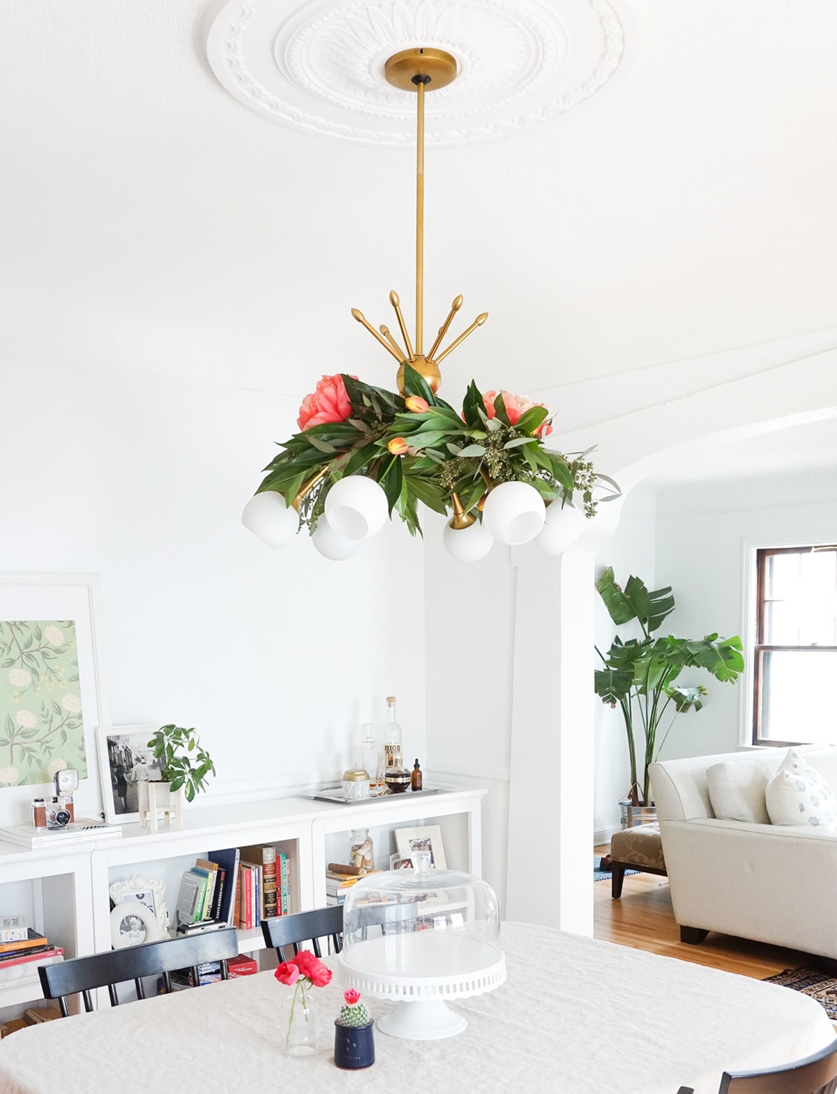 Pretty for Spring! This DIY floral chandelier garland is the perfect touch to your living room decor during your next dinner! - sugar and cloth