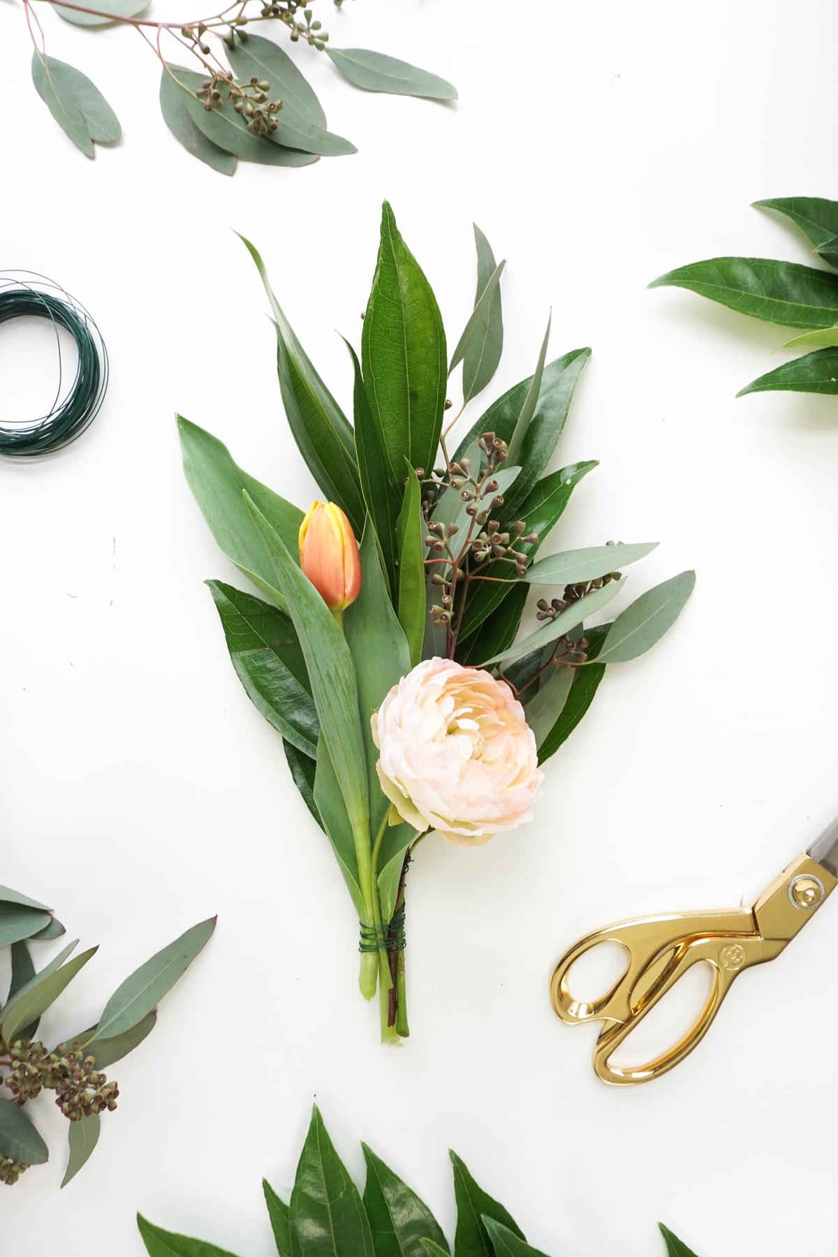 Pretty for Spring! This DIY floral chandelier garland is the perfect touch to your living room decor during your next dinner! - sugar and cloth