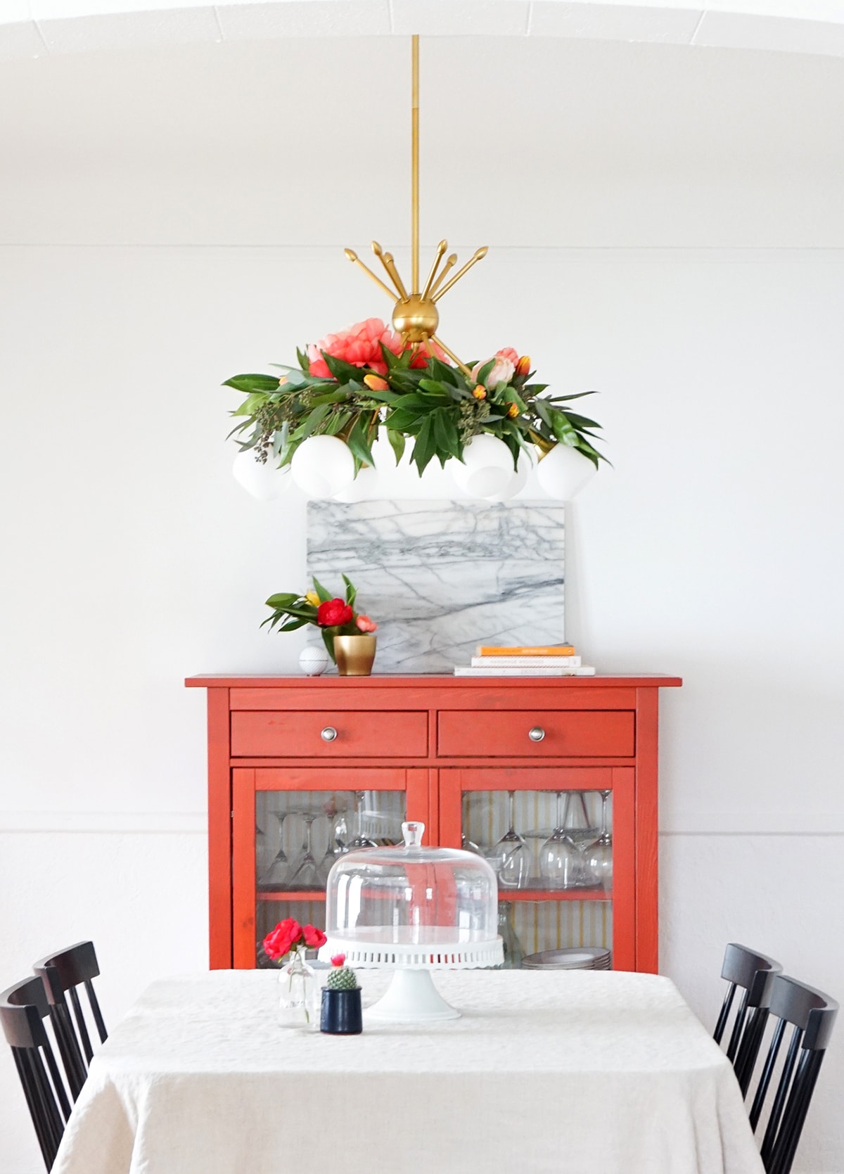 Pretty for Spring! This DIY floral chandelier garland is the perfect touch to your living room decor during your next dinner! - sugar and cloth