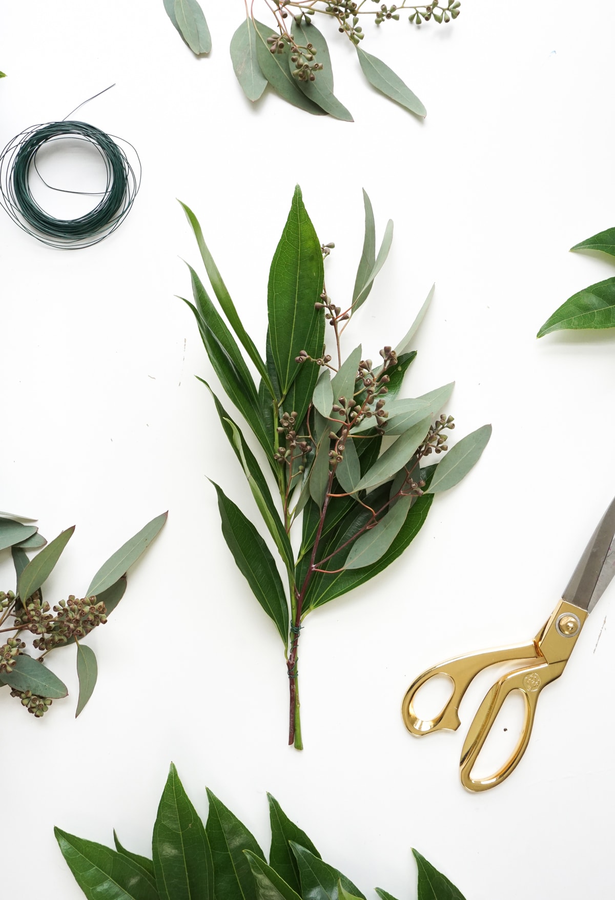 Pretty for Spring! This DIY floral chandelier garland is the perfect touch to your living room decor during your next dinner! - sugar and cloth