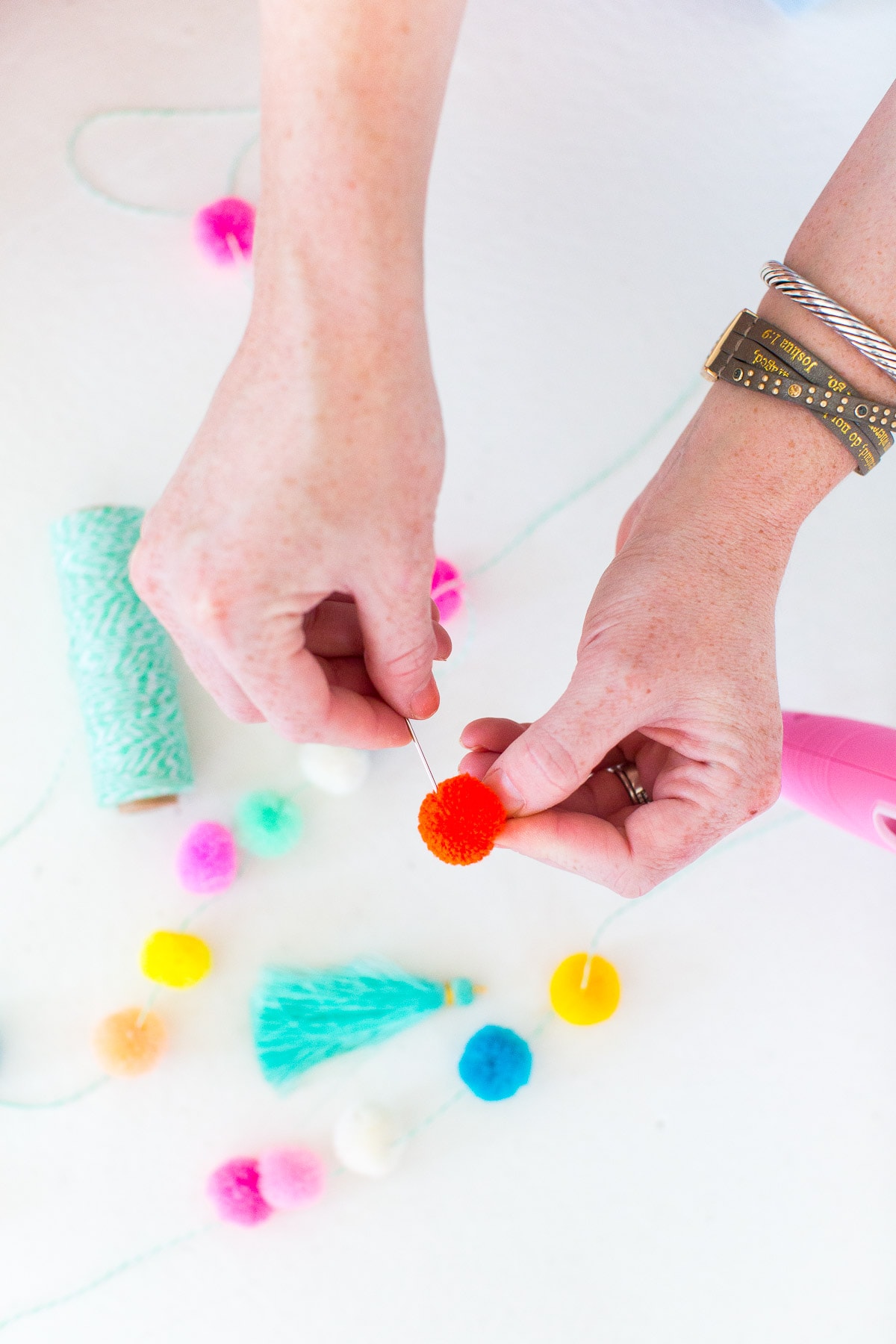 Make a statement this Summer with our DIY pom pom tassel circle pool bag! - sugar and cloth - houston blogger