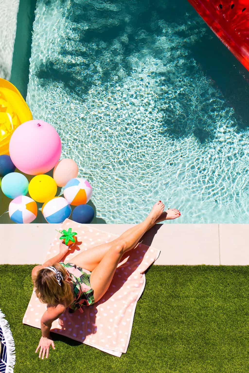 Lounging poolside cool with the perfect Spotify Summer playlist! Sugar & Cloth