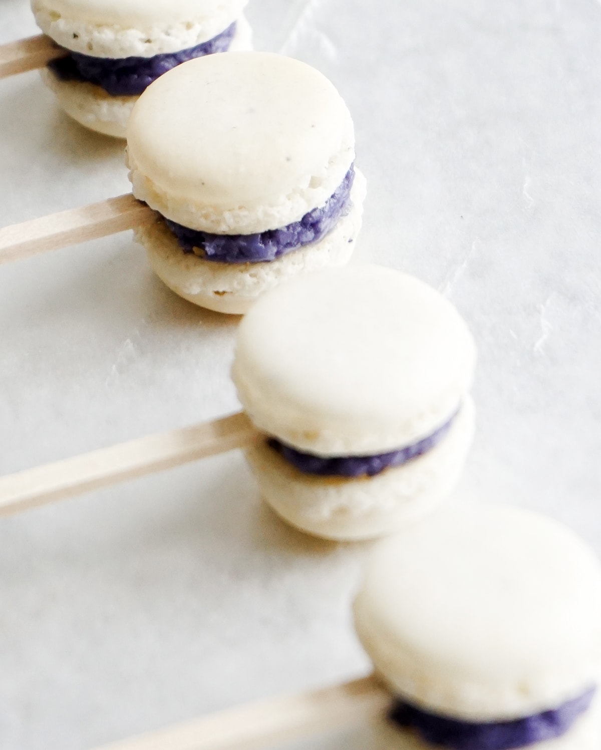 The cutest mini macaron cockail swizzle sticks for garnishing and eating, too! - Sugar and Cloth - houston blogger