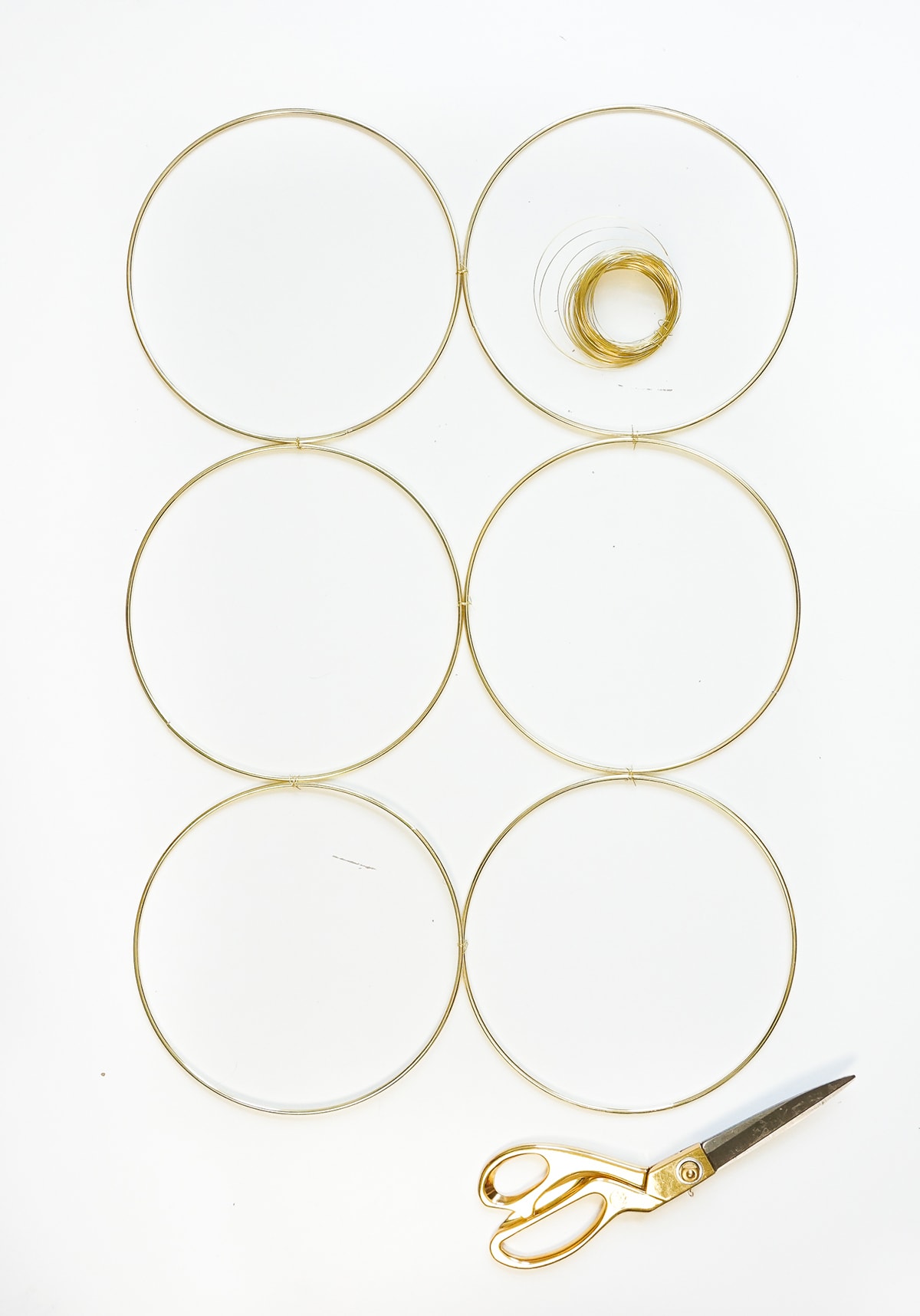 A simple and sophisticated DIY brass ring wall decor to hang at home! - sugar and cloth