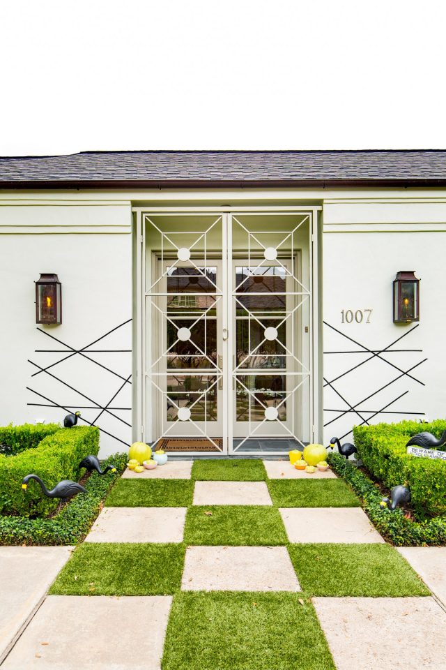 a perfectly spooky geometric entry way - Palm Springs Inspired Halloween Entryway Decor & Product Round Up by top Houston lifestyle blogger Ashley Rose - #halloweendecor #halloween #decor #home #holidays #curbappeal #palmsprings #midcentury
