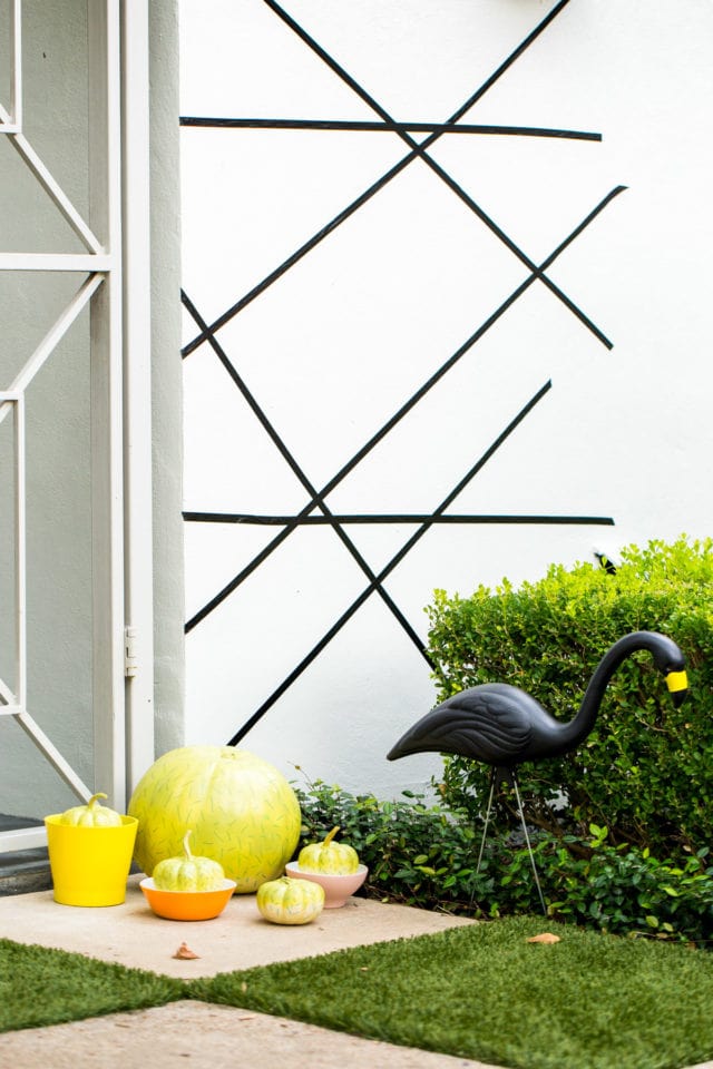washi tape makes for an easy Palm Springs Inspired Halloween Entryway Decor & Product Round Up by top Houston lifestyle blogger Ashley Rose - #halloweendecor #halloween #decor #home #holidays #curbappeal #palmsprings #midcentury
