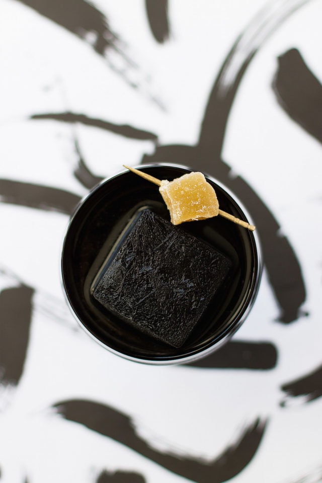 a minimalist cocktail... The Detoxing Activated Charcoal Cocktail Recipe by top Houston Lifestyle Blogger Ashley Rose of Sugar and Cloth #recipe #cocktail #halloween #detox #charcoal 