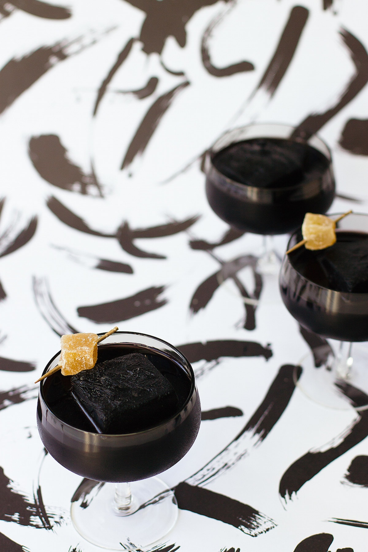 happy friyay! Detoxing Activated Charcoal Cocktail Recipe by top Houston Lifestyle Blogger Ashley Rose of Sugar and Cloth #recipe #cocktail #halloween #detox #charcoal 