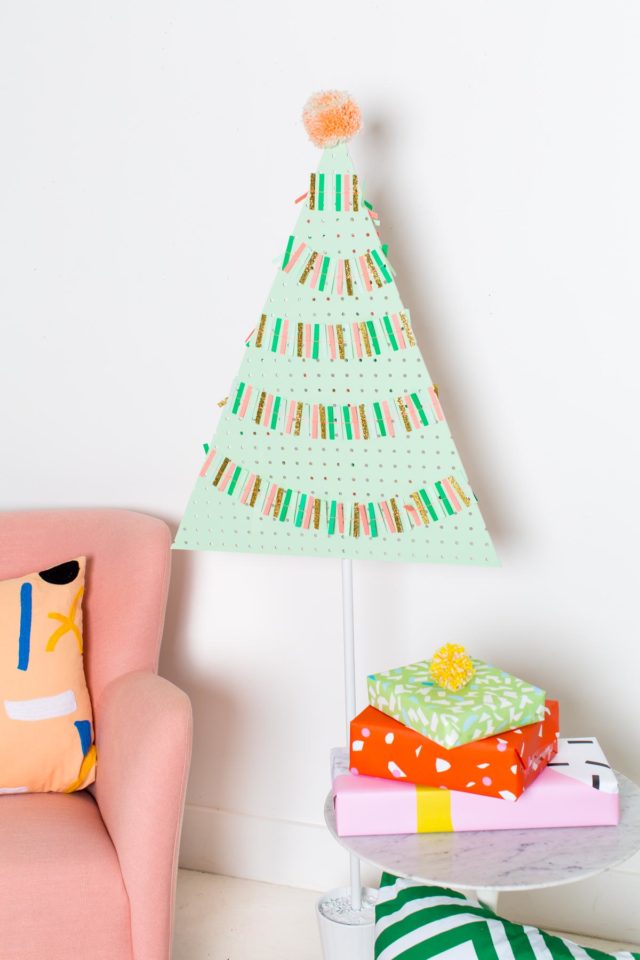 A DIY Pegboard Christmas Tree by DIY Blogger Ashley Rose of Sugar & Cloth