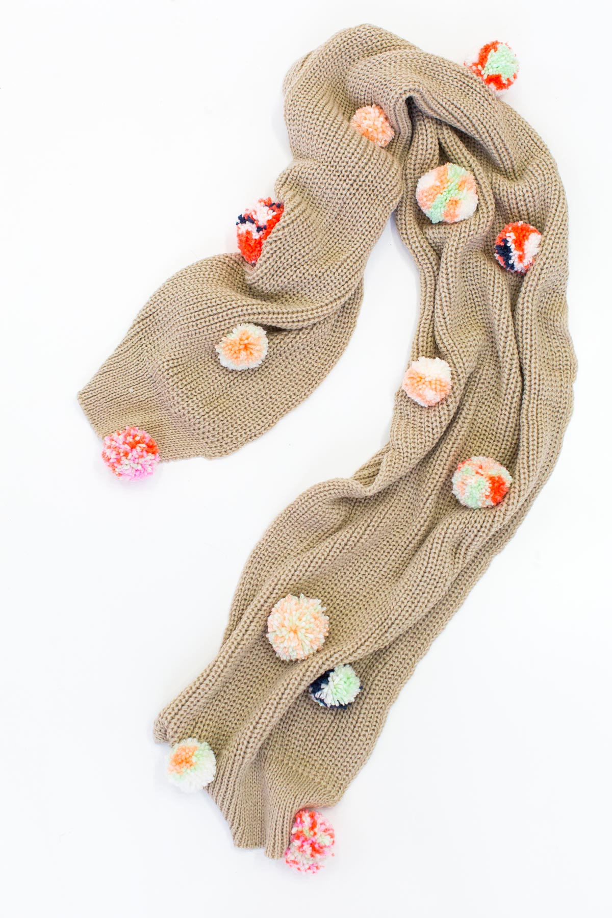 DIY Statement Pom Pom Scarf by Ashley Rose of the award winning DIY and lifestyle blog, Sugar & Cloth.