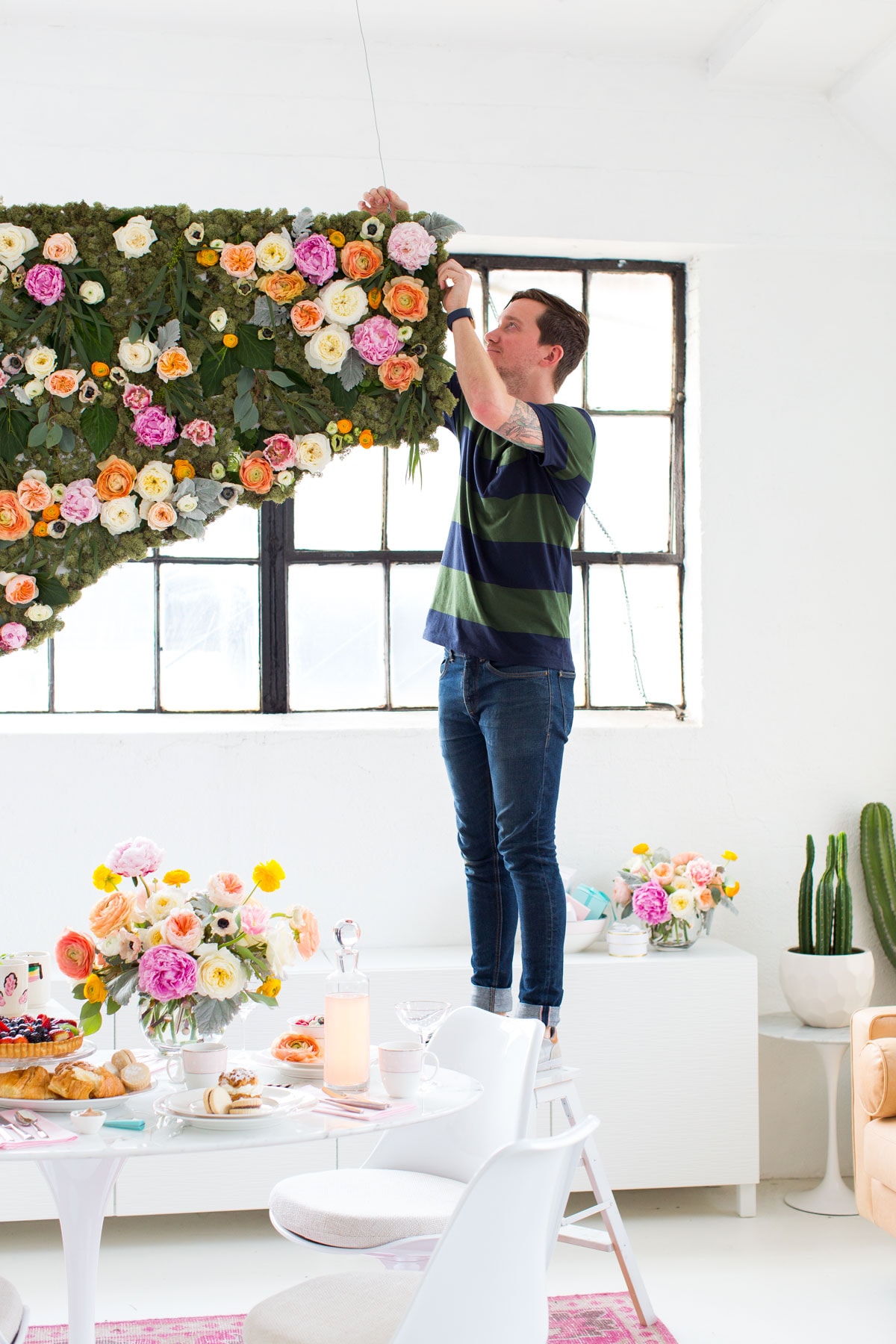 DIY Hanging Flower Wall Installation by Top Houston Lifestyle Blogger Ashley Rose of Sugar & Cloth | #diy #flowerwall #wallhanging #flower #floral #diydecor #backdrop 