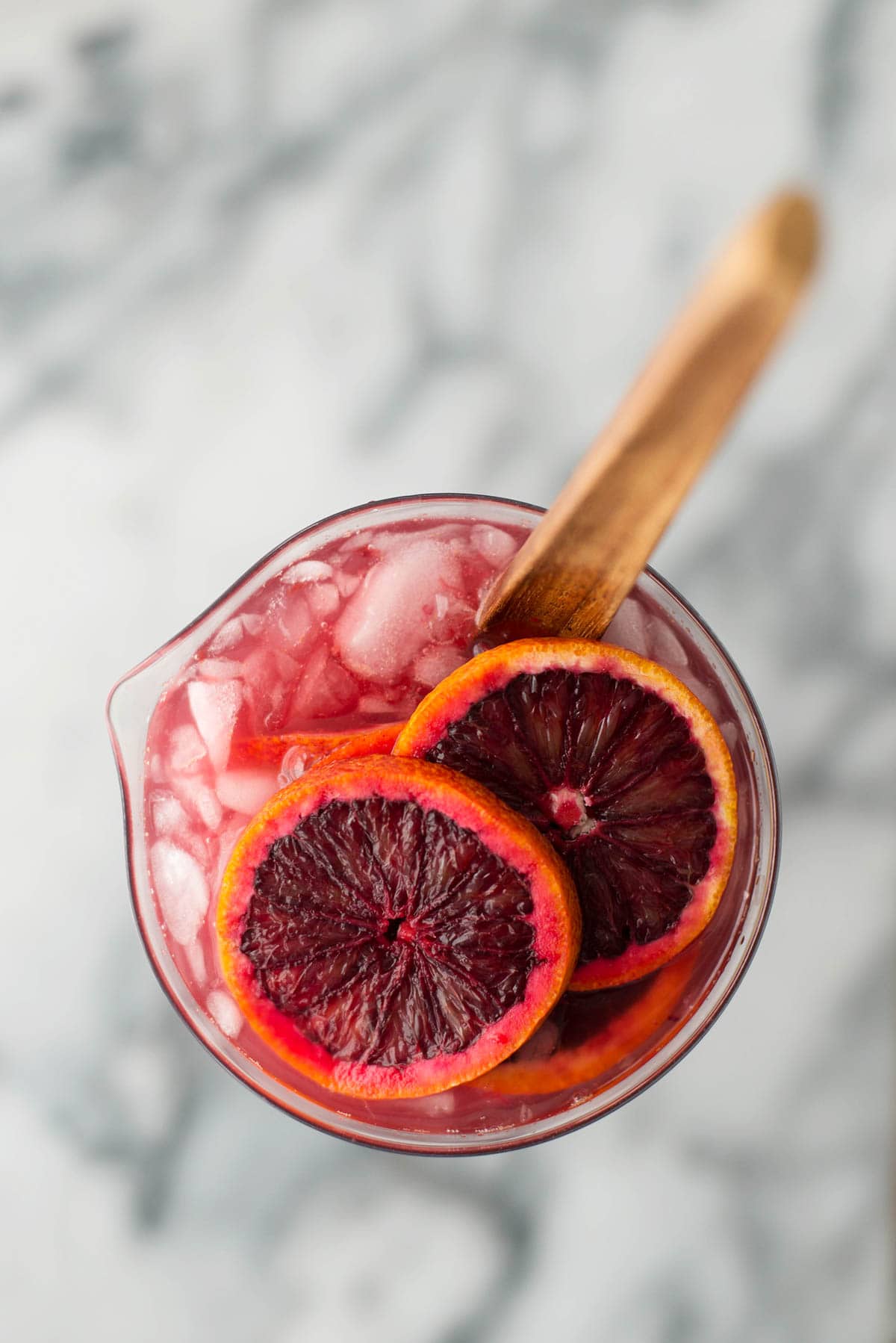 Blood orange sangria recipe by Sugar & Cloth, an award winning DIY and recipe blog.