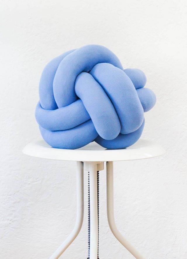 DIY knot pillow by Sugar & Cloth, an award winning DIY, recipes, and home decor blog.