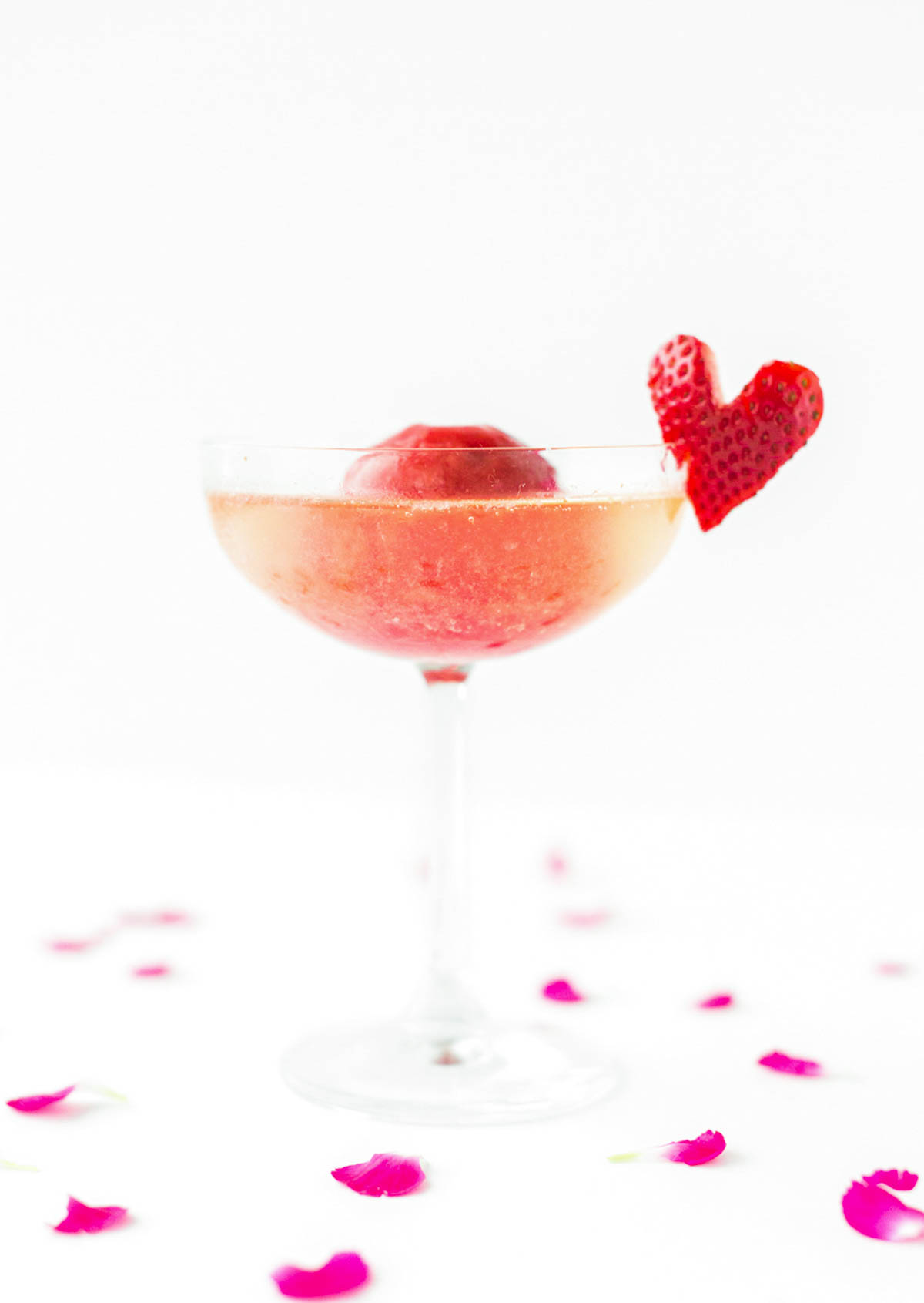 Strawberry and Rose Sorbet Champagne by Sugar & Cloth, an award wining DIY, home decor, and recipes blog.