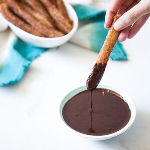 Cinnamon Churros with Chili Chocolate by Sugar & Cloth, an award winning DIY, recipes, and home decor blog.