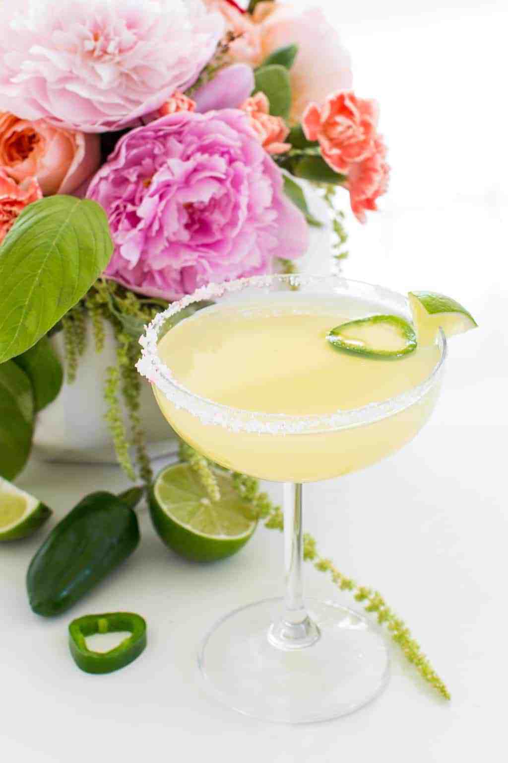 photo of a garnished skinny margarita recipe with salt by sugar and cloth
