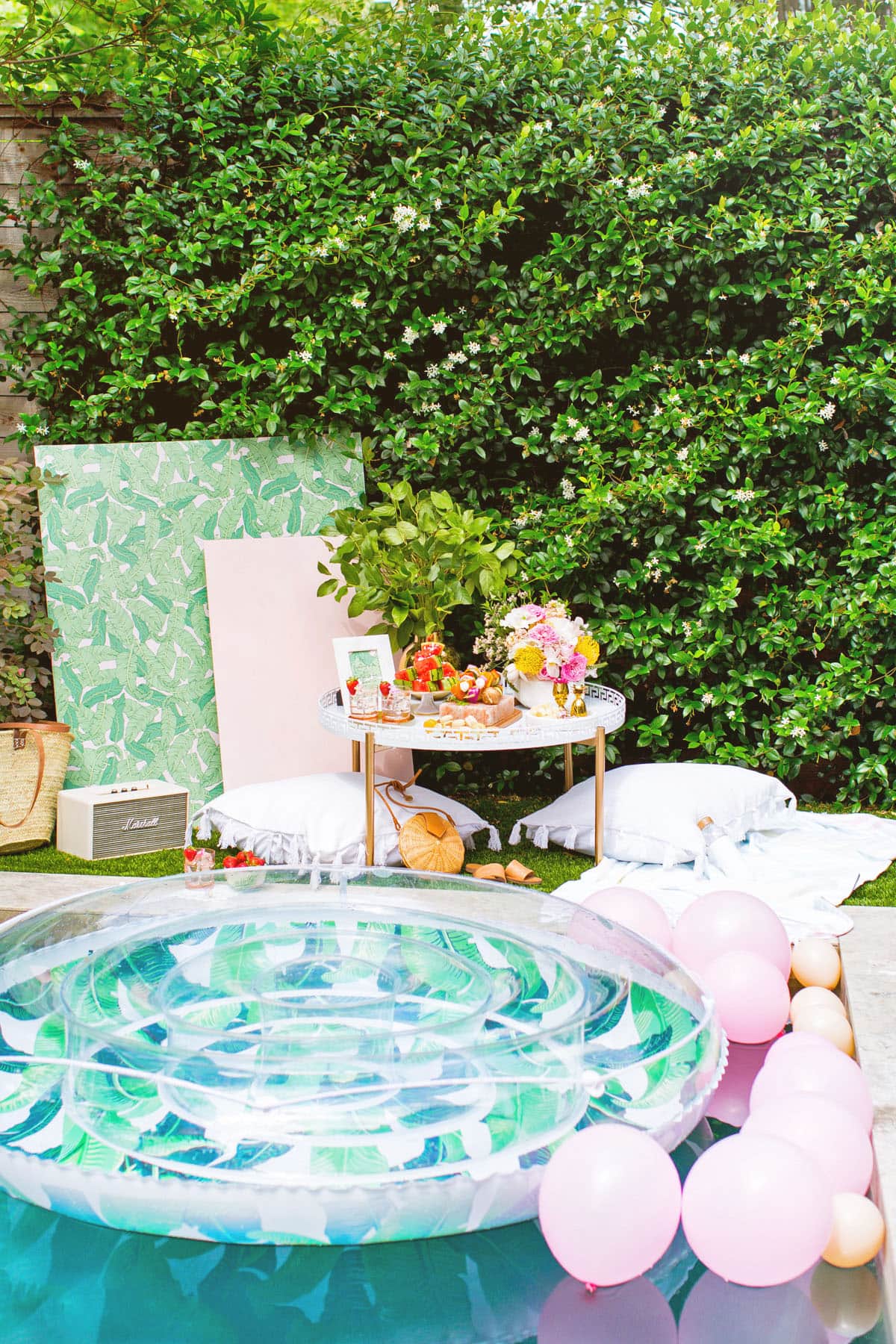 The couple's pool party had a casual 70s inspired pool decor vibe