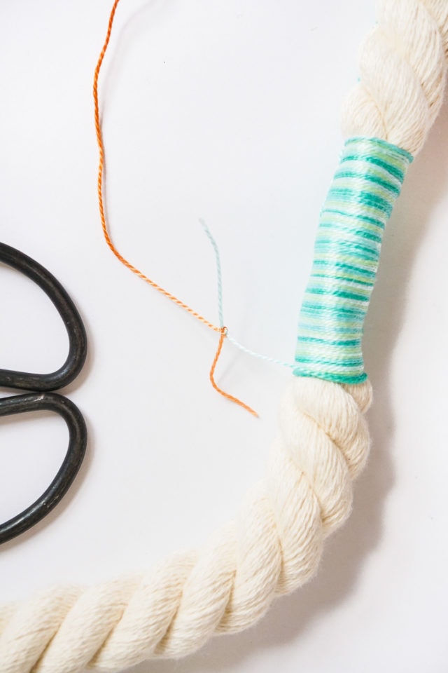 Step 2 -DIY Door Handle Tassels by Ashley Rose of Sugar & Cloth, a top lifestyle blog in Houston, Texas #DIY #door #tassels #fringe #colorful #doorhandle #homedecor #simple #rope #diyhomedecor