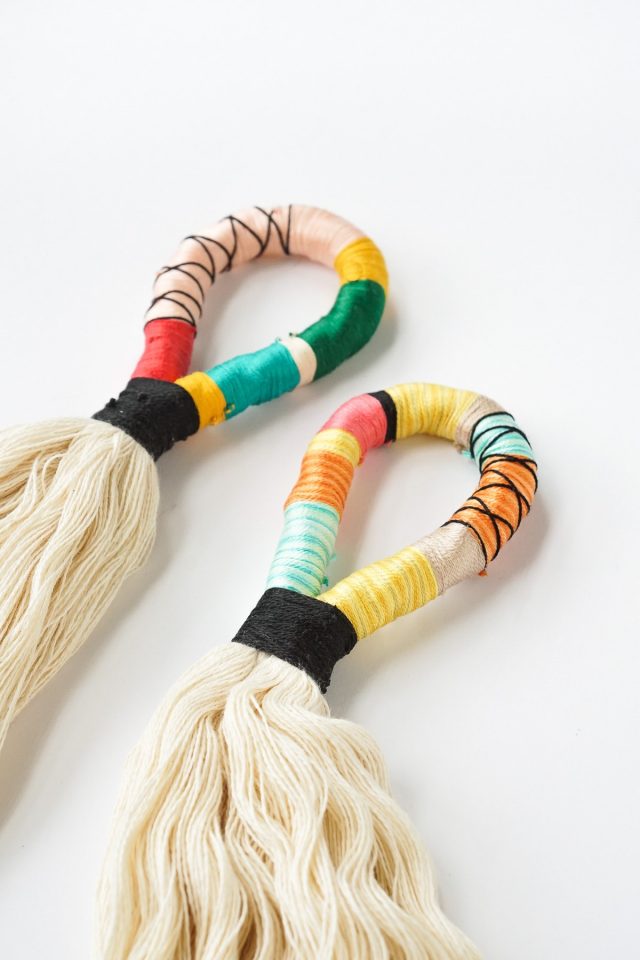 DIY Door Handle Tassels by Ashley Rose of Sugar & Cloth, a top lifestyle blog in Houston, Texas #DIY #door #tassels #fringe #colorful #doorhandle #homedecor #simple #rope #diyhomedecor