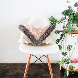 DIY Woven Yarn Fringe Throw Pillow by Ashley Rose of Sugar & Cloth, a top lifestyle blog in Houston, Texas