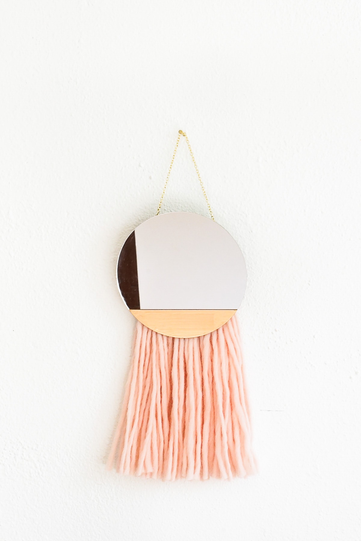 DIY Fringed Mirror Wall Hanging by Ashley Rose of Sugar & Cloth, a top lifestyle blog in Houston, Texas